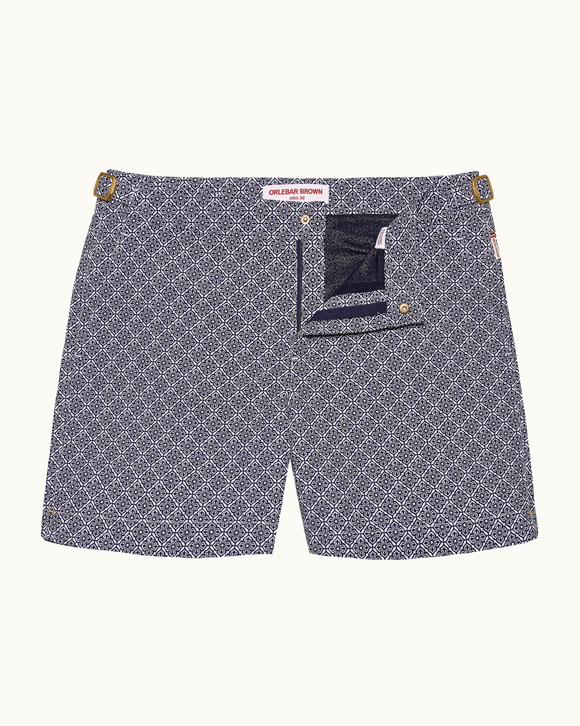 Patterned shorts with a visible brand label on a white background