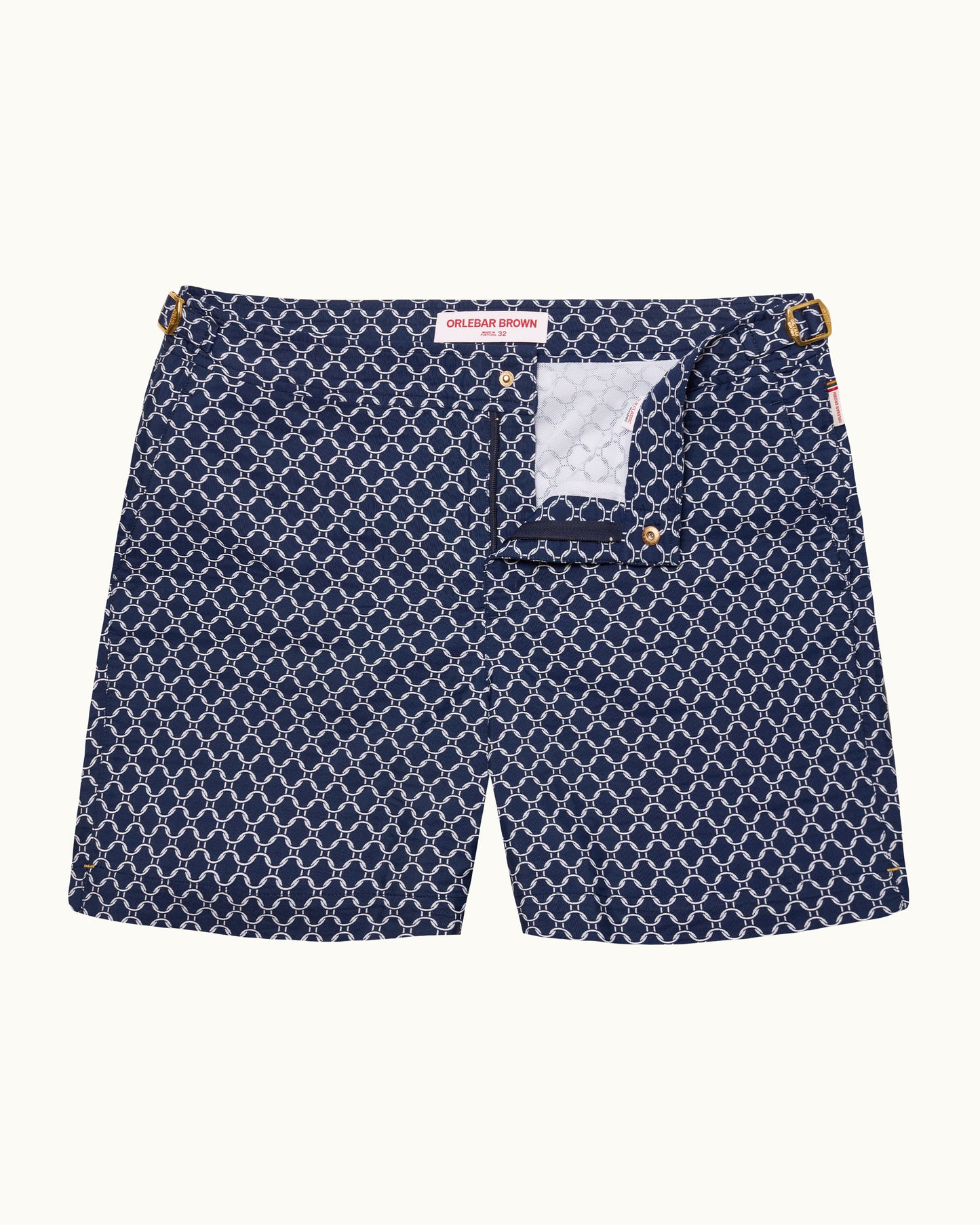 Navy patterned tailored swim shorts against a white background 