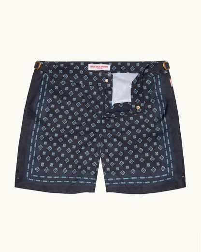 Navy blue shorts with white pattern on a white background