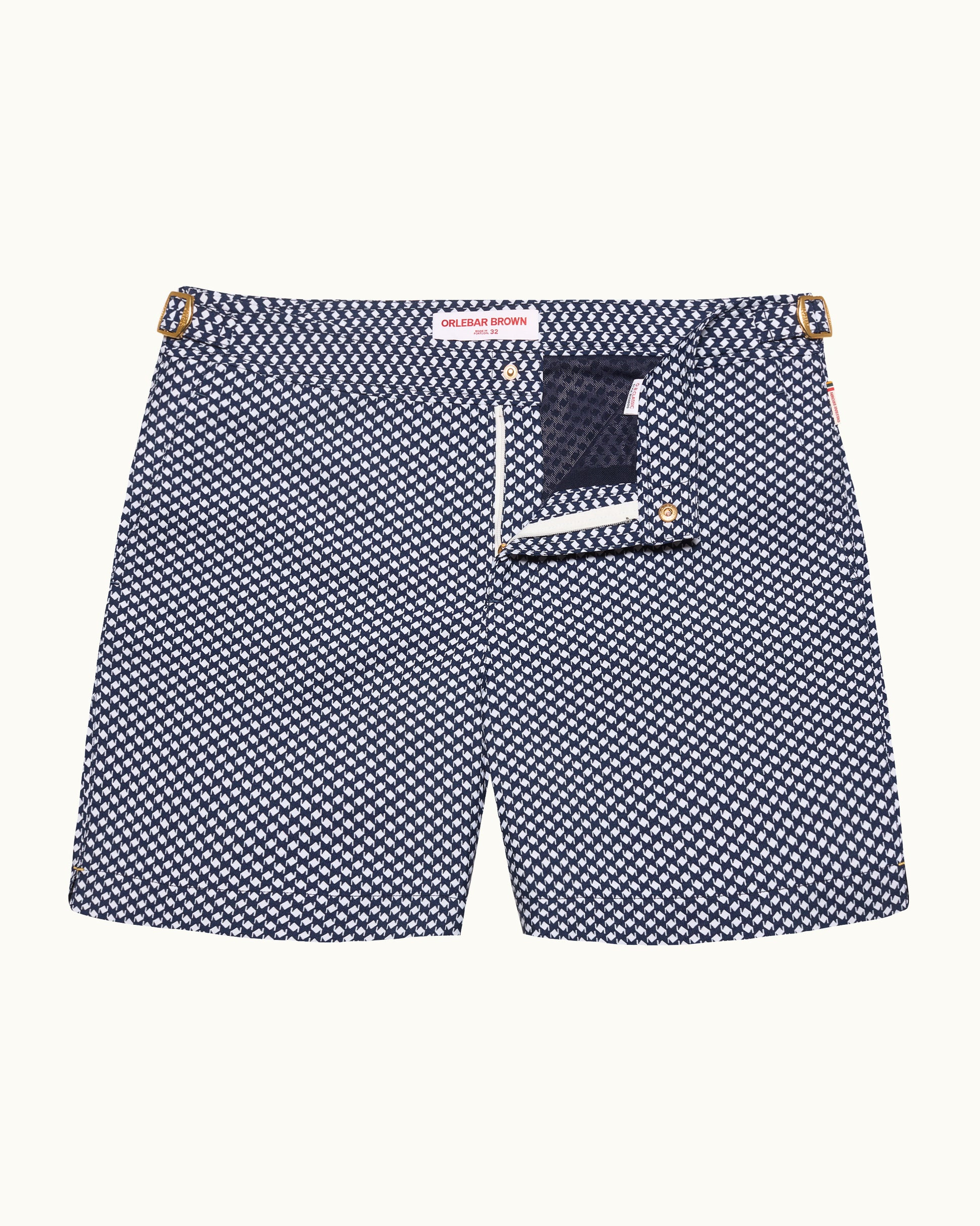 Navy and white checkered swim shorts on a white background