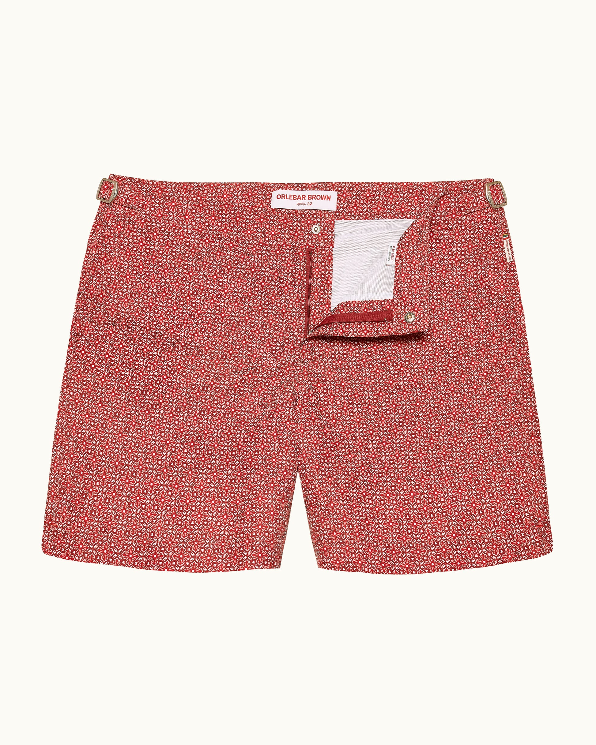 Red patterned shorts on a white background