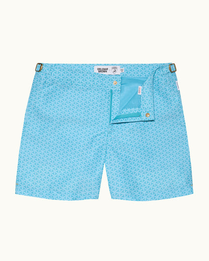 Light blue shorts with a subtle pattern on a white background