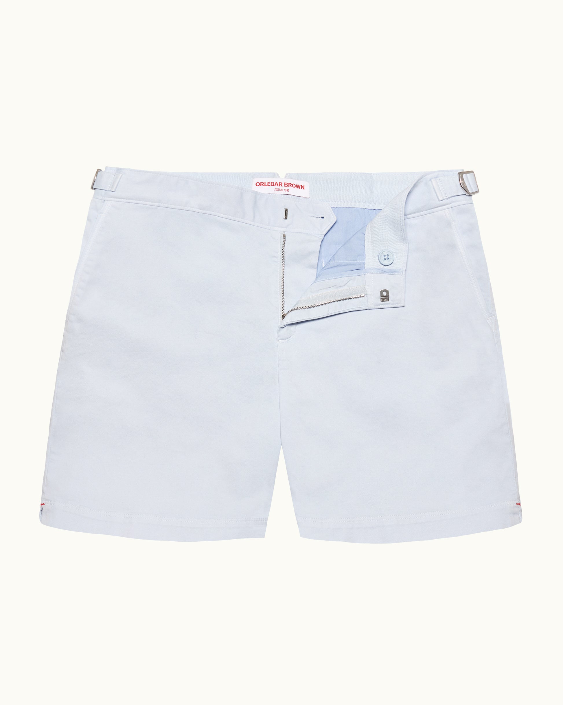 Light blue shorts with a brand label on a white background