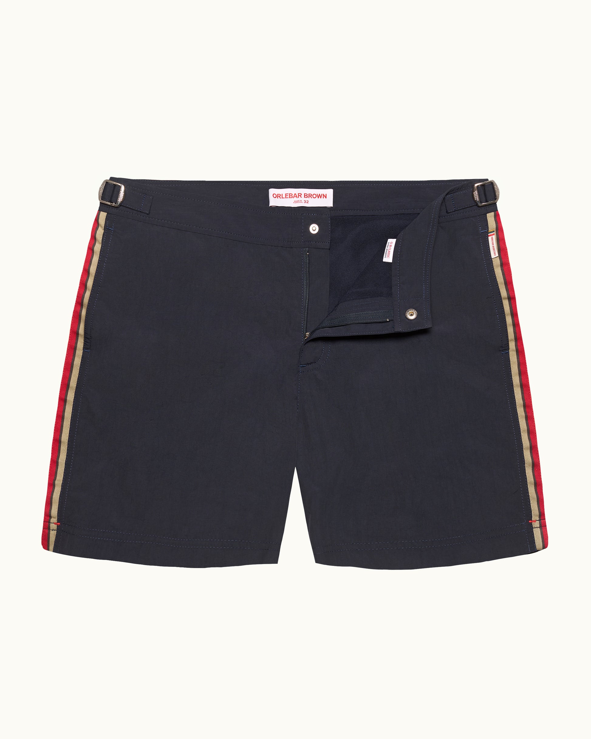 Navy shorts with red and beige striped sides on a white background