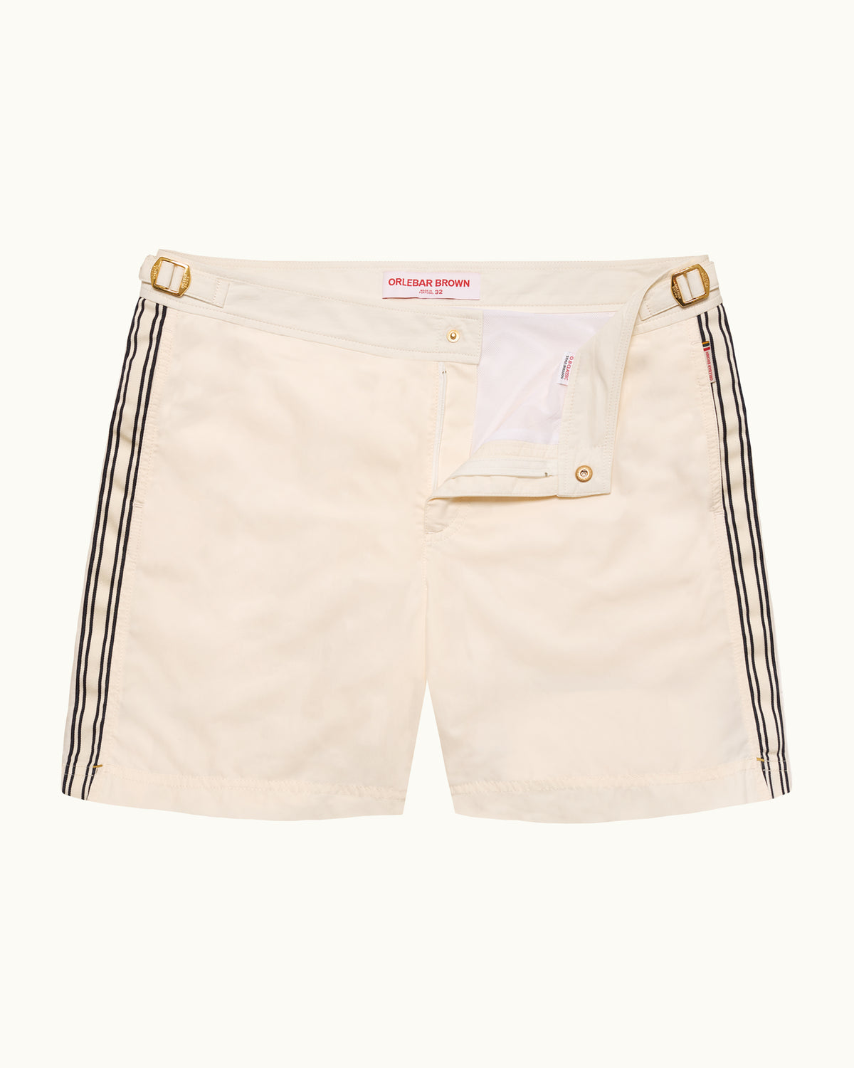 Beige shorts with black stripes on a white background