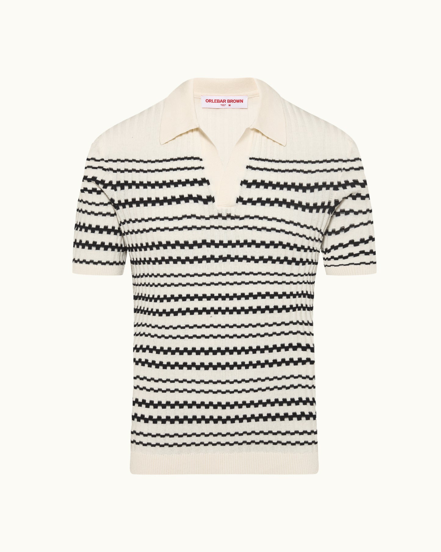 Black and white striped polo shirt on a white background
