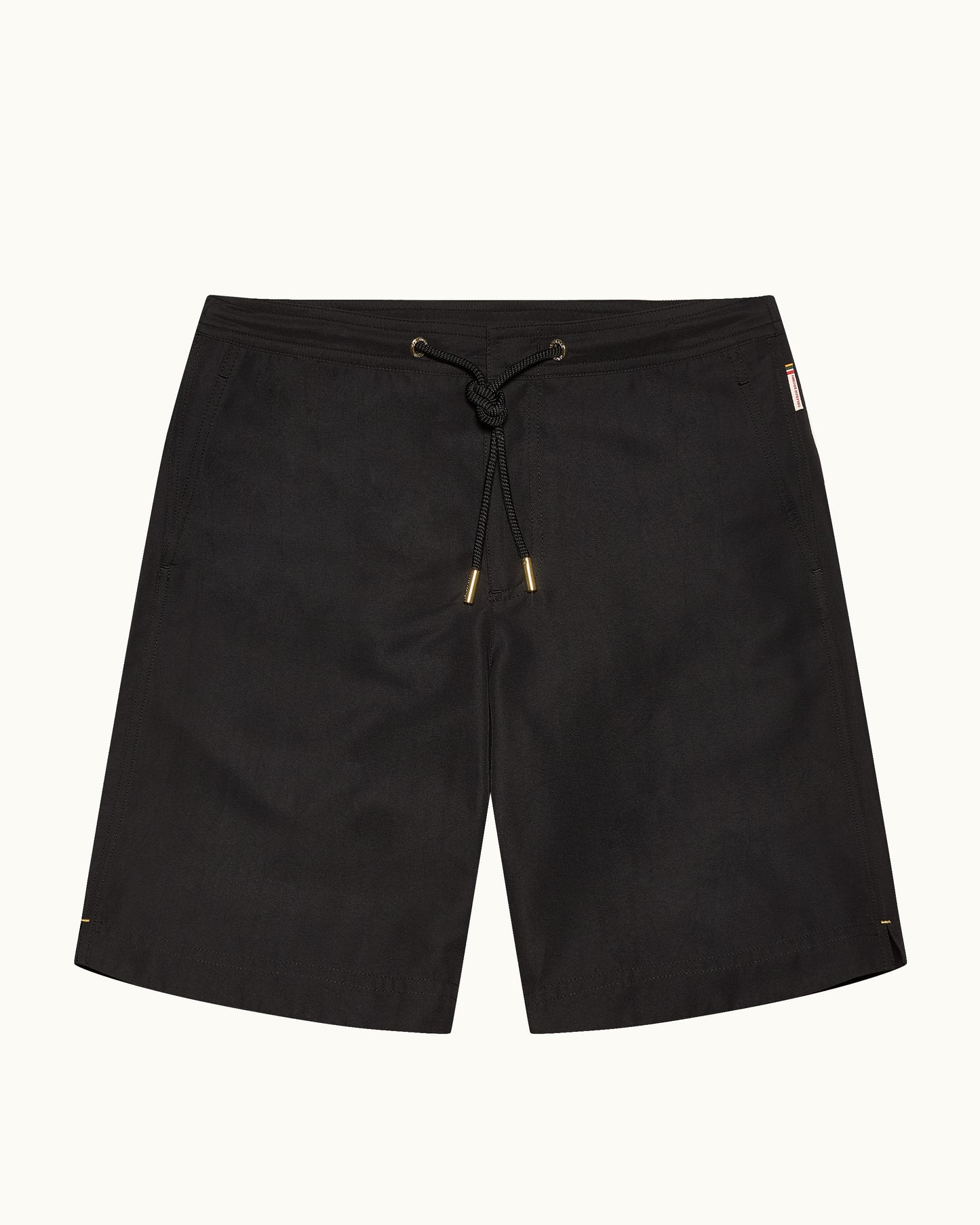Black drawstring waist swim shorts on a plain background