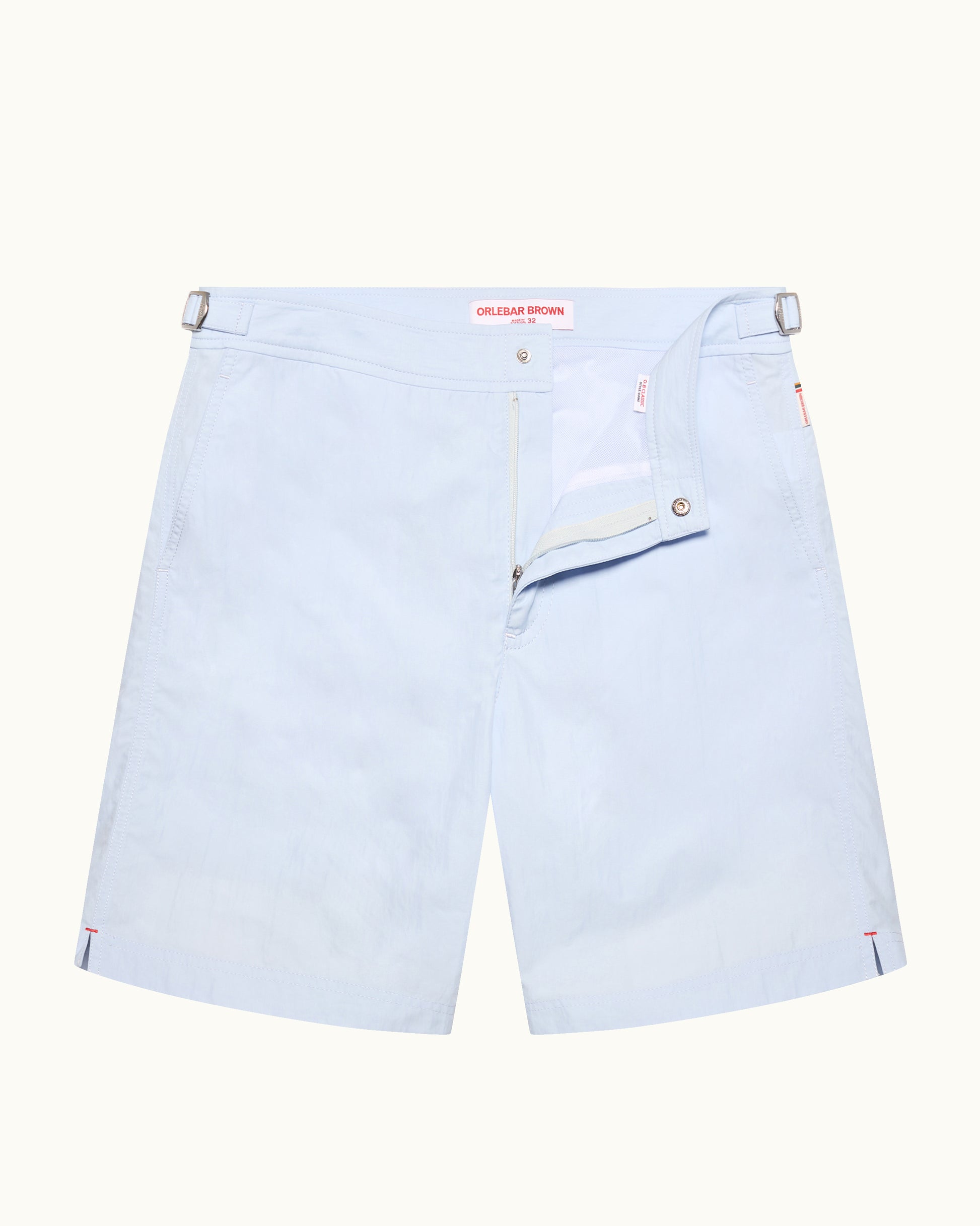 Light blue shorts with a brand logo on a white background