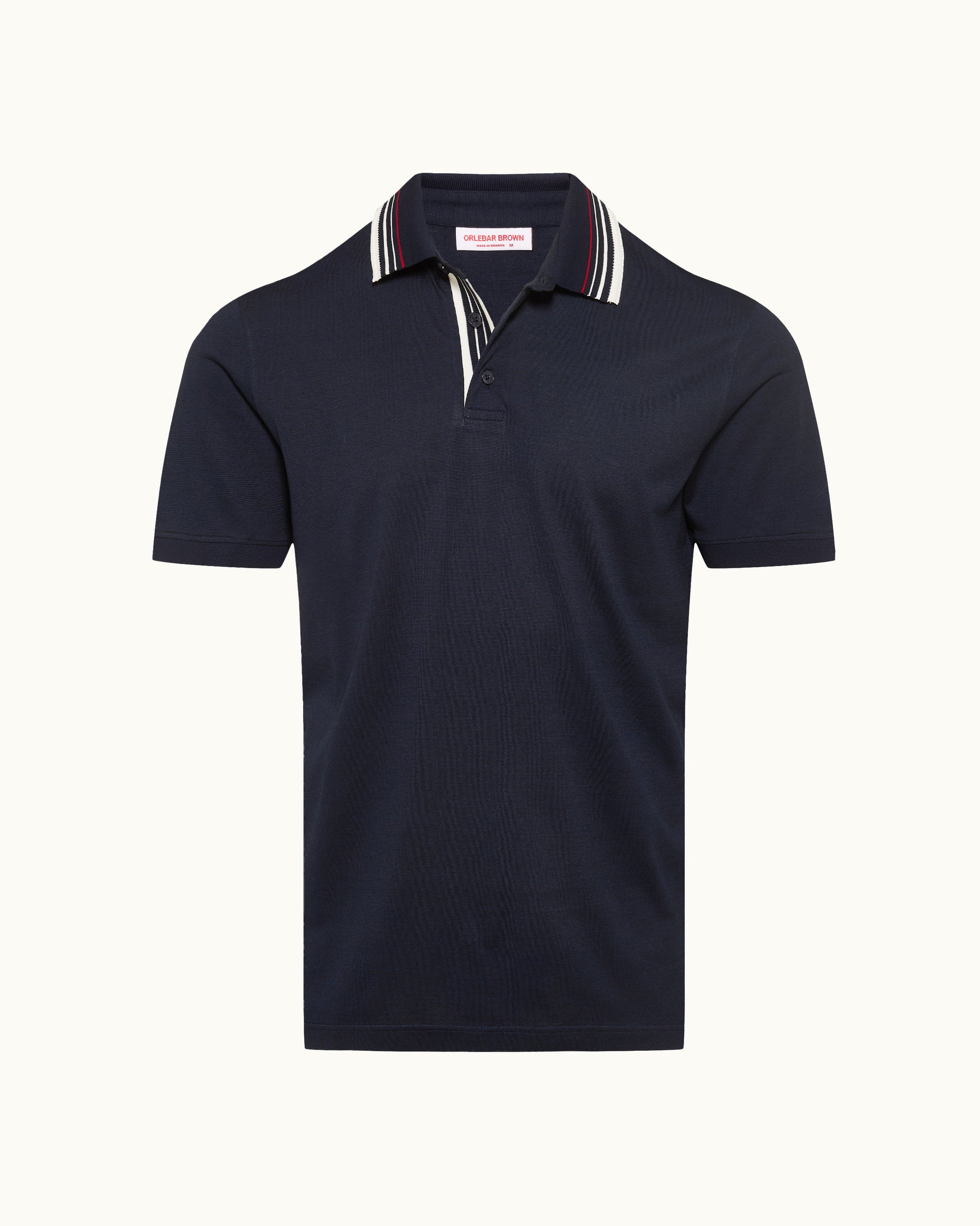 Navy polo shirt with striped collar on a white background