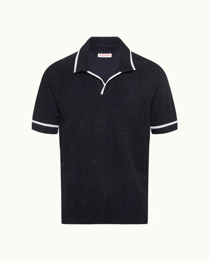 Black polo shirt with white trim on a white background