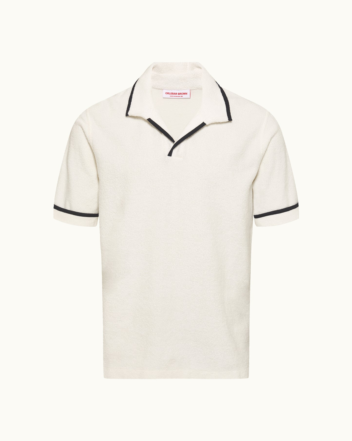 White polo shirt with black trim on a white background