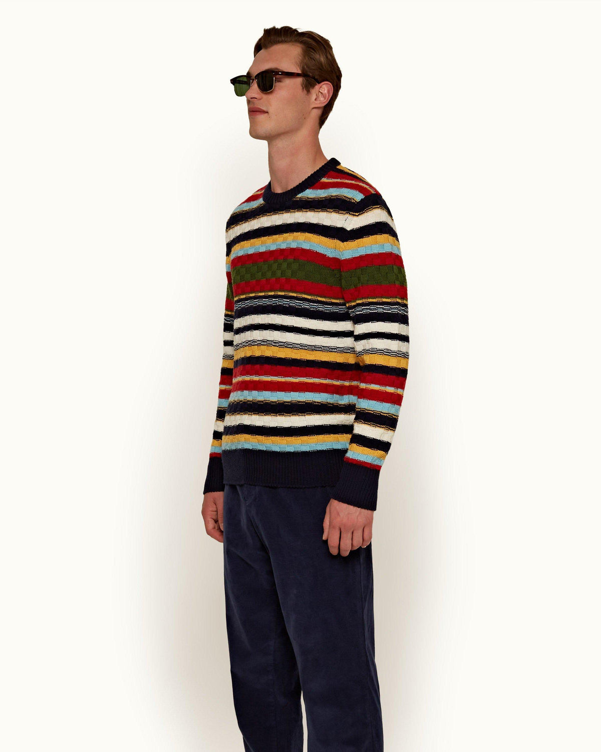 Ethan Stripe - Mens Volcanic Red/Dune Stripe Crew Neck Merino Jumper Left Angle Model View