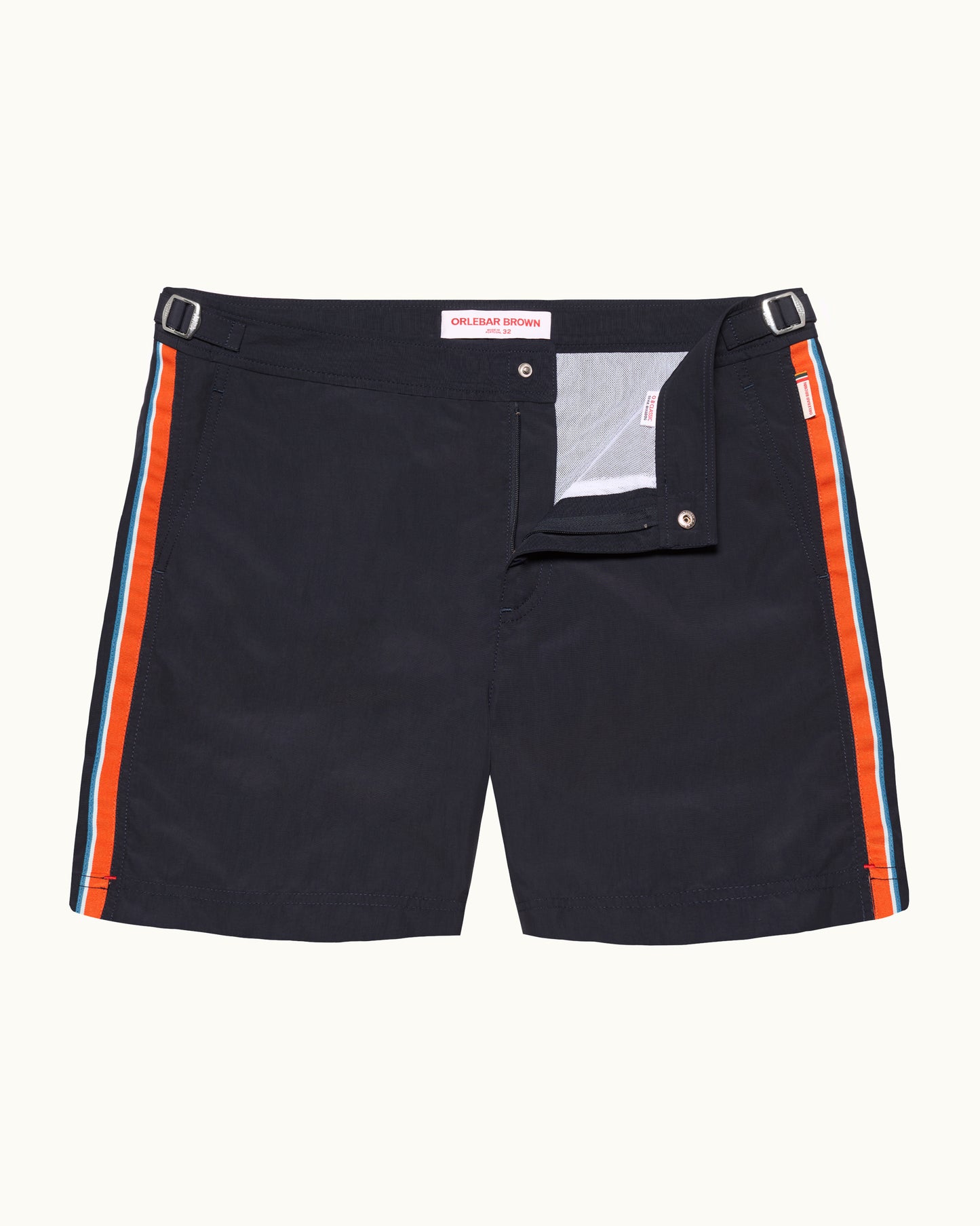 Navy shorts with orange stripes on a white background