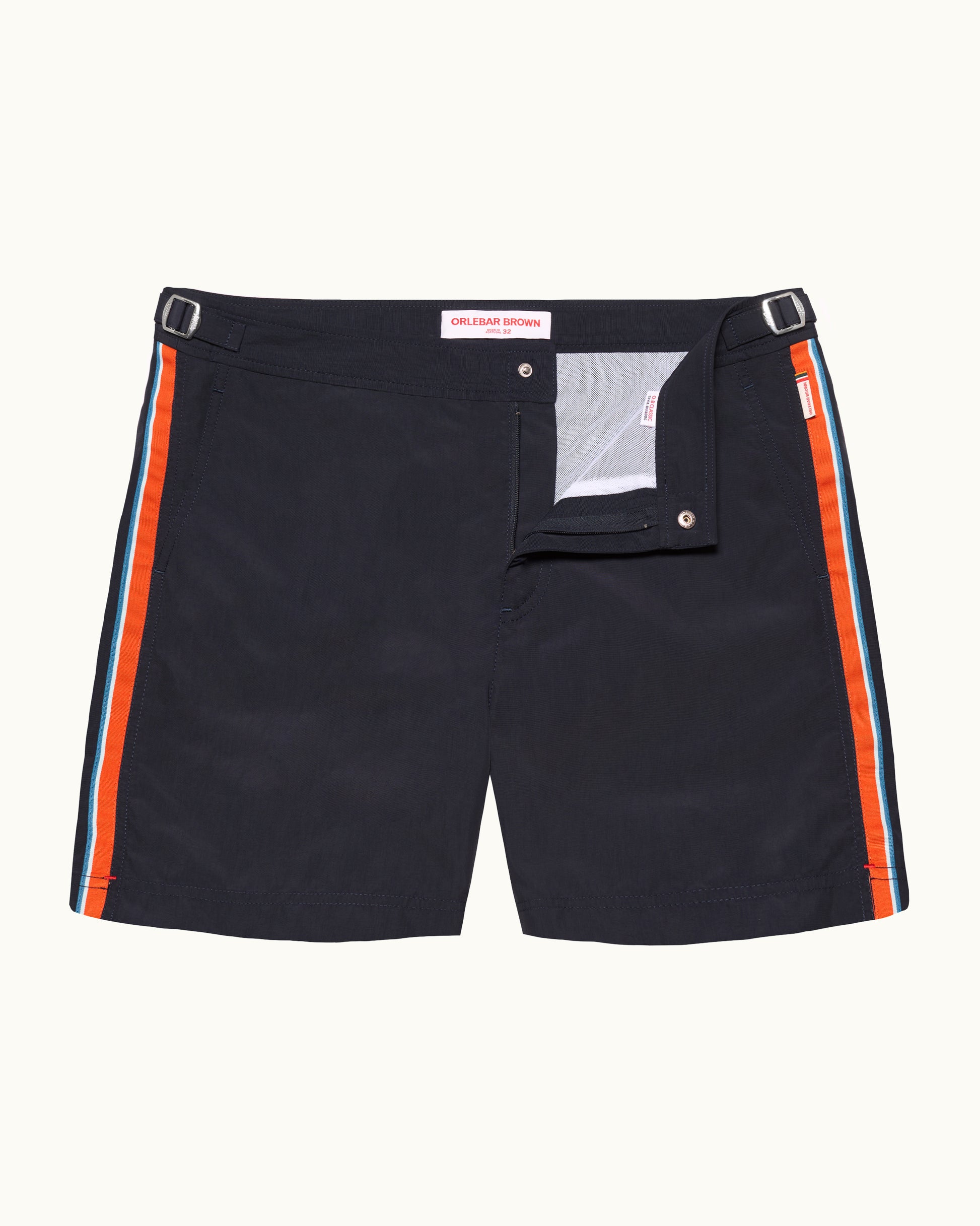 Navy shorts with orange stripes on a white background