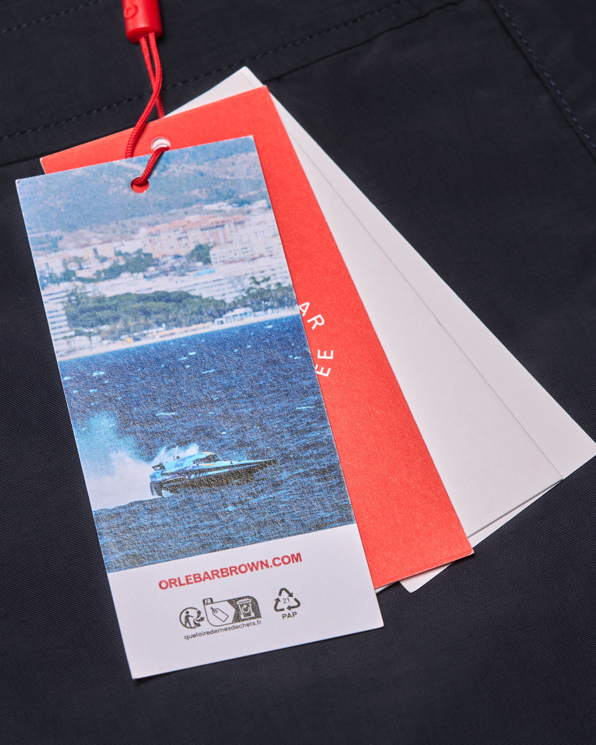 Product tag with scenic design and branding on a dark background