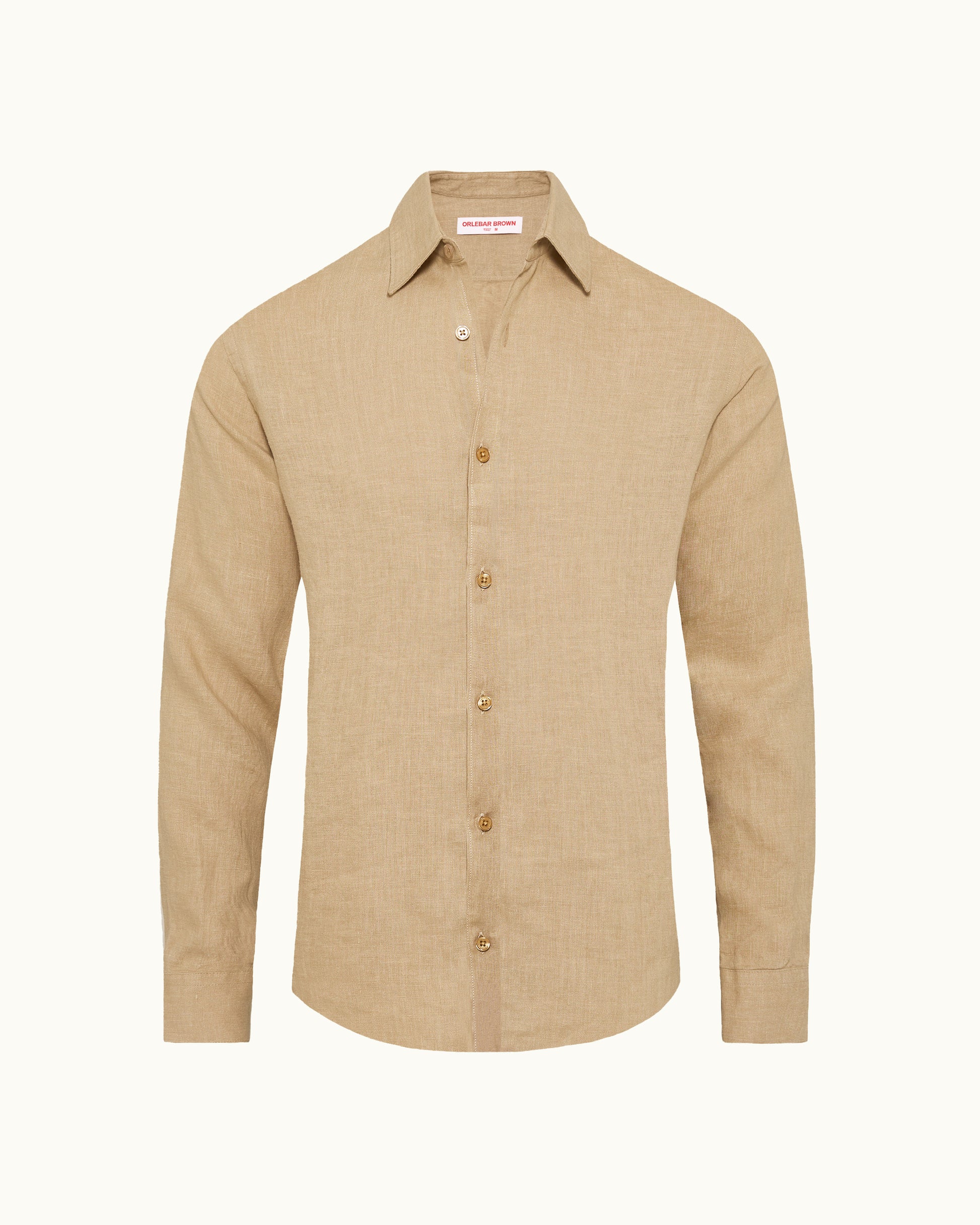 Biscuit coloured shirt on a white background