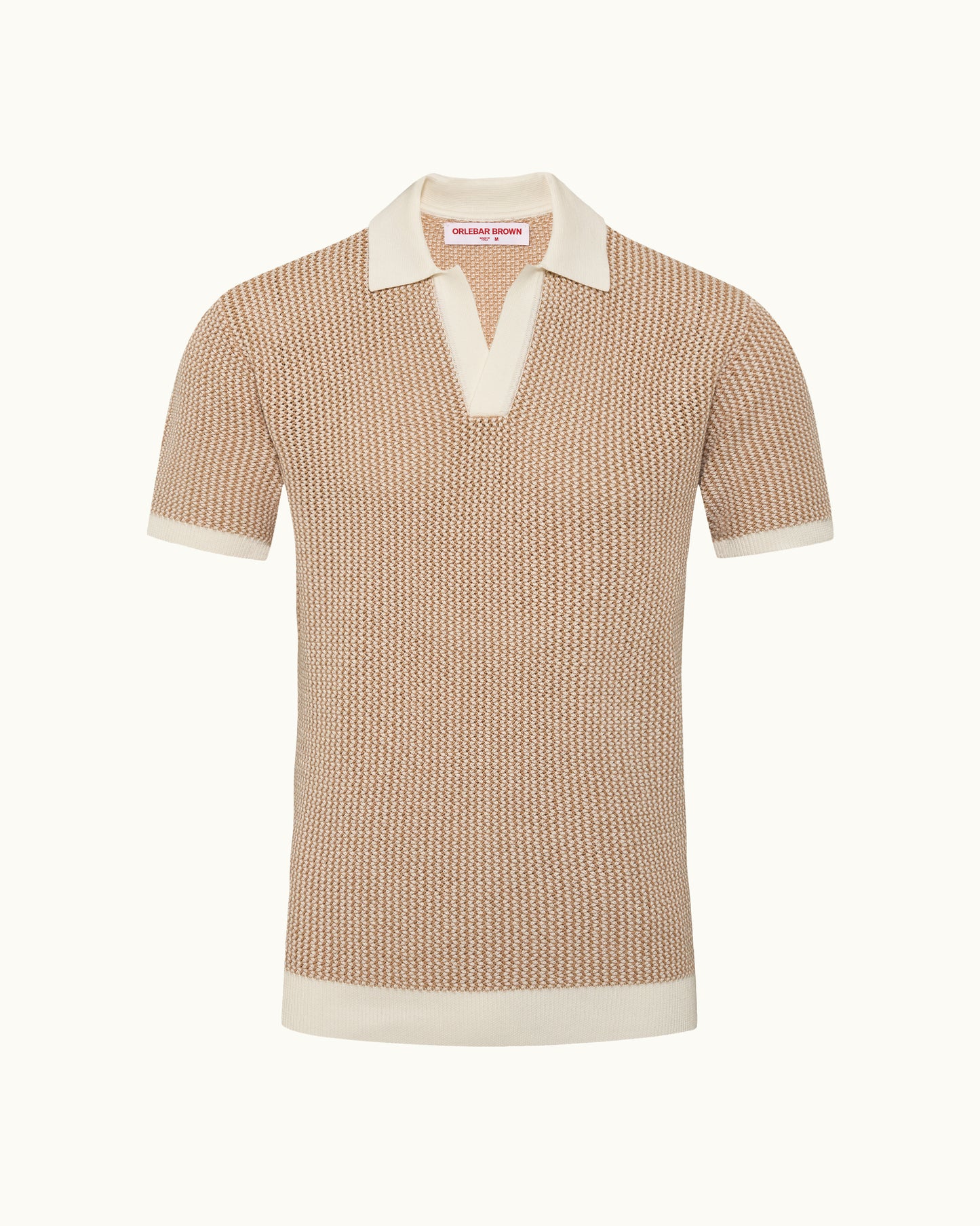 Beige knitted polo shirt with white collar and trim on a white background