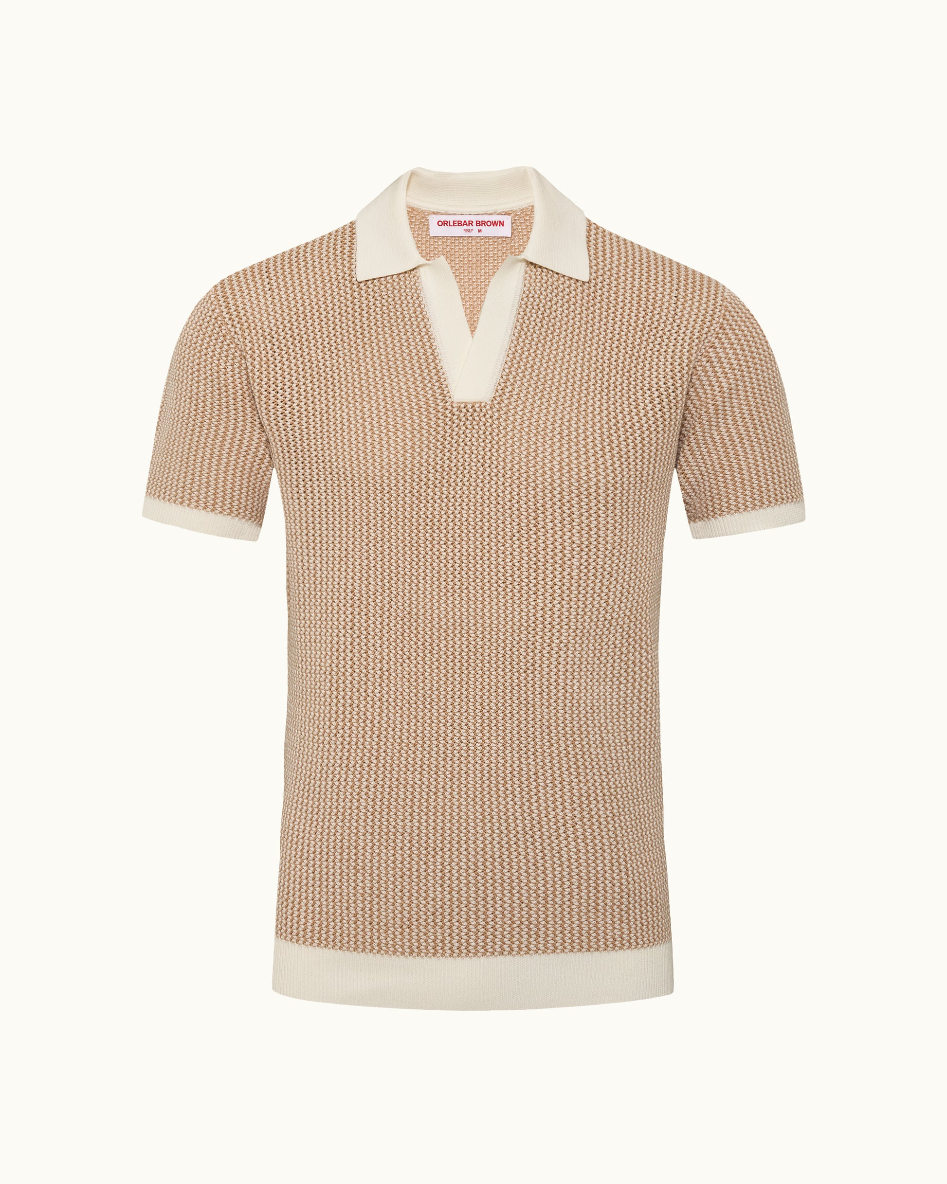 Beige knitted polo shirt with white collar and trim on a white background