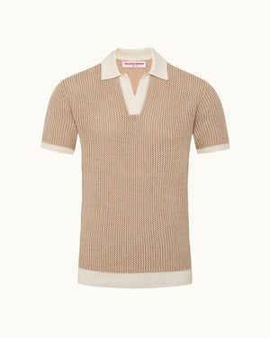 Beige knitted polo shirt with white collar and trim on a white background
