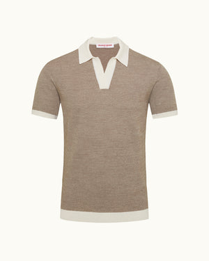 Brown polo shirt with white collar and trim on a white background
