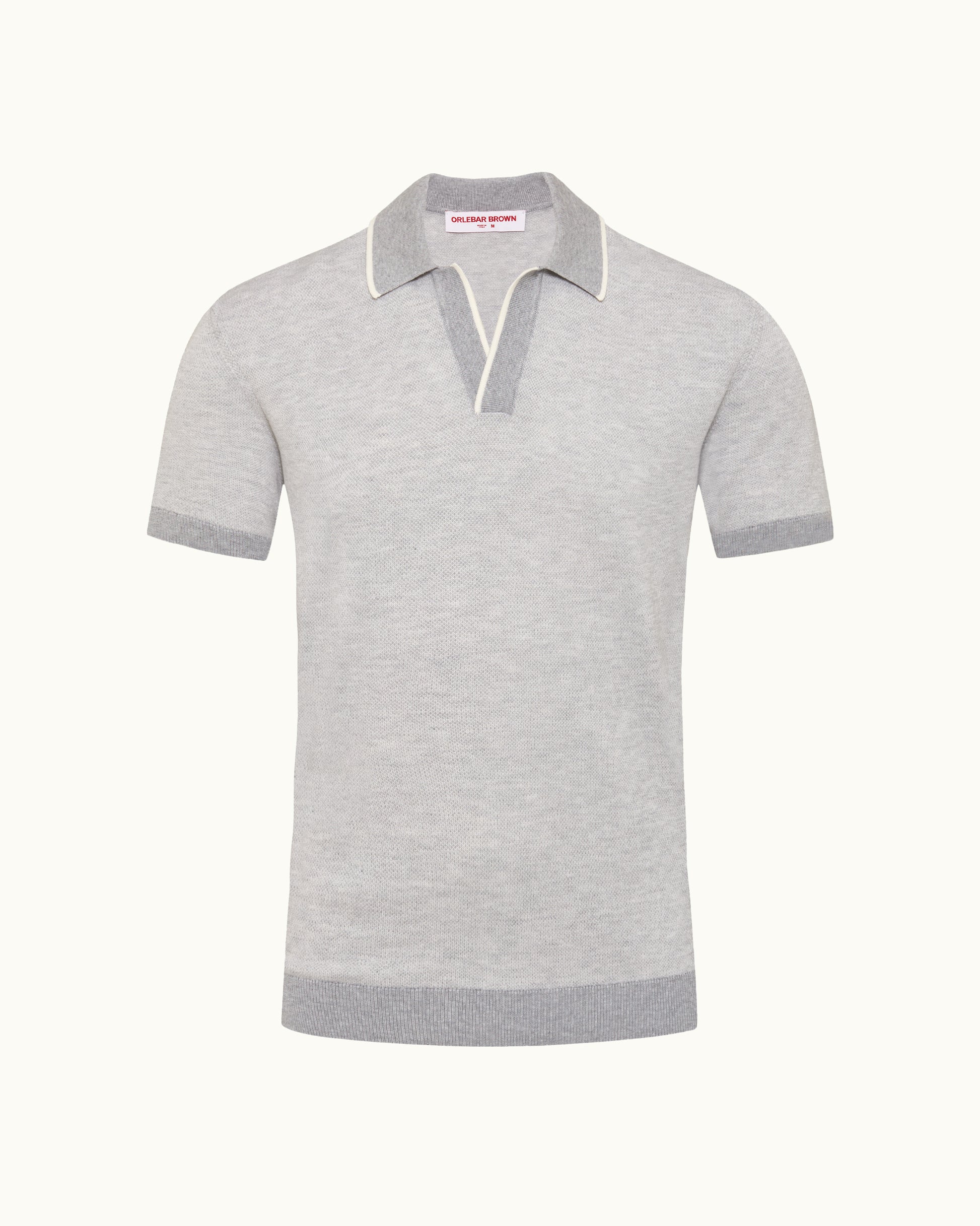 Gray polo shirt with striped collar on a white background