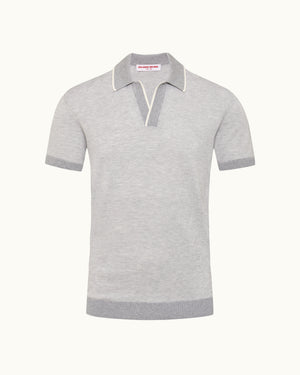 Gray polo shirt with striped collar on a white background