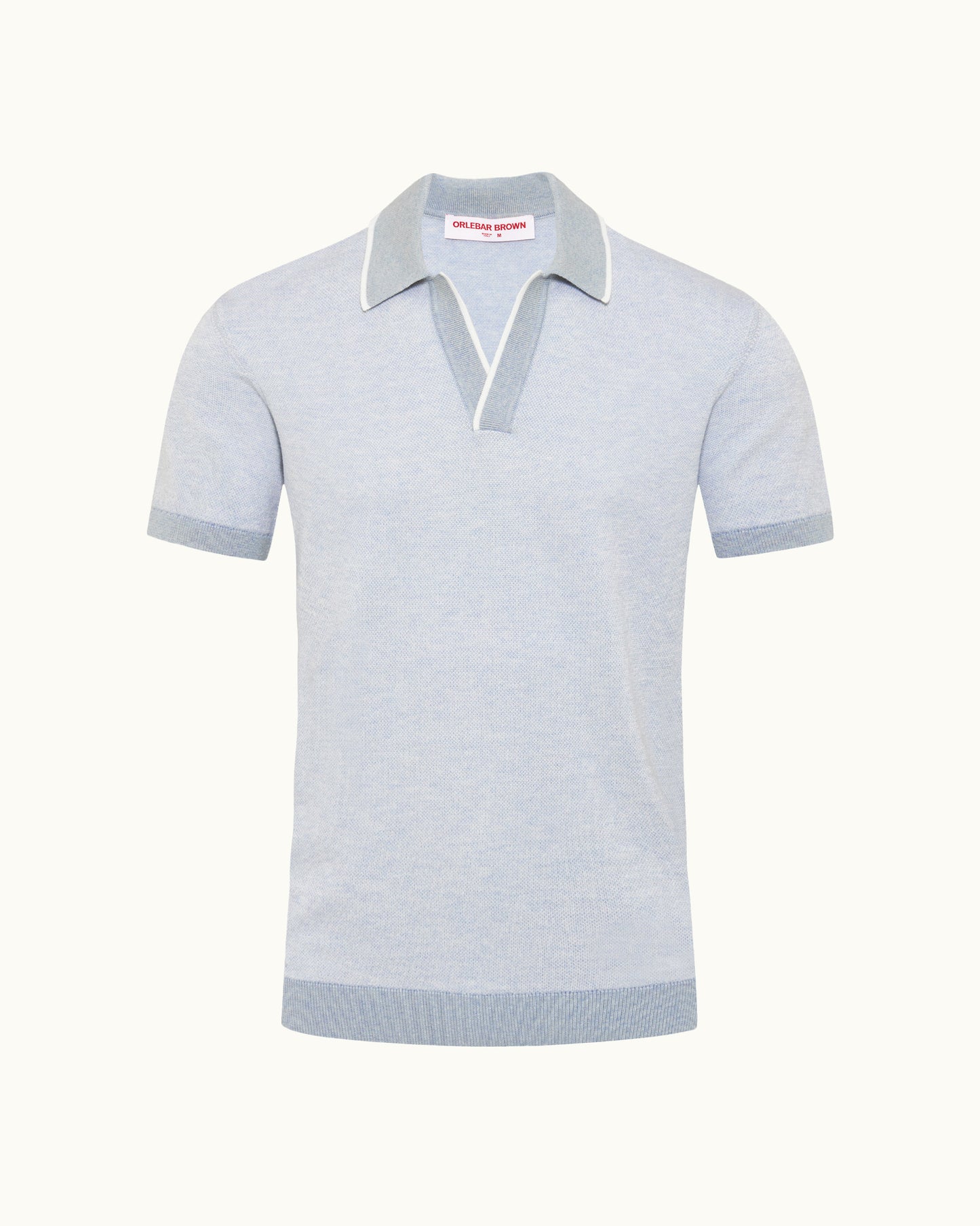 Light blue polo shirt with white collar on a white background