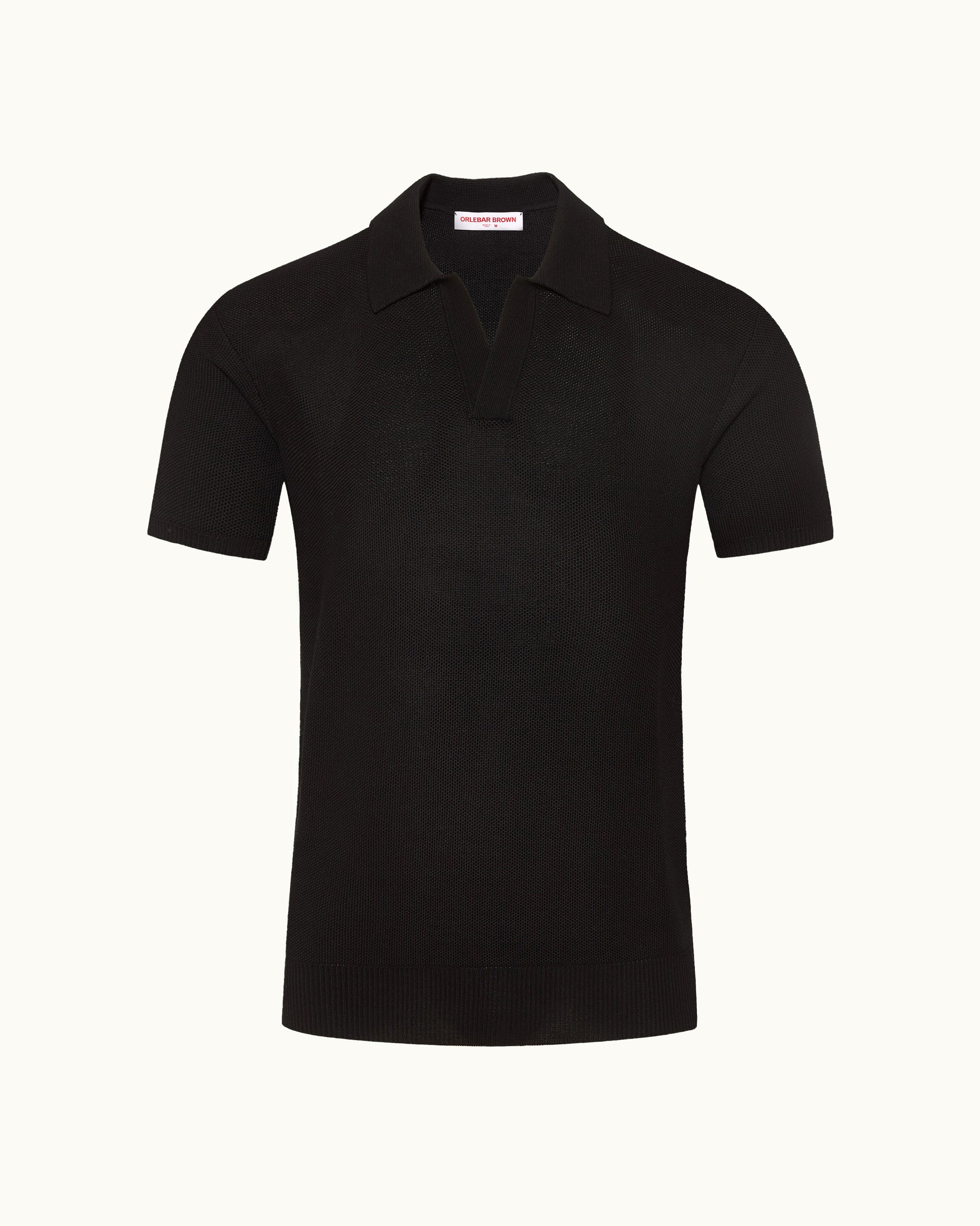 Black polo shirt on a white background