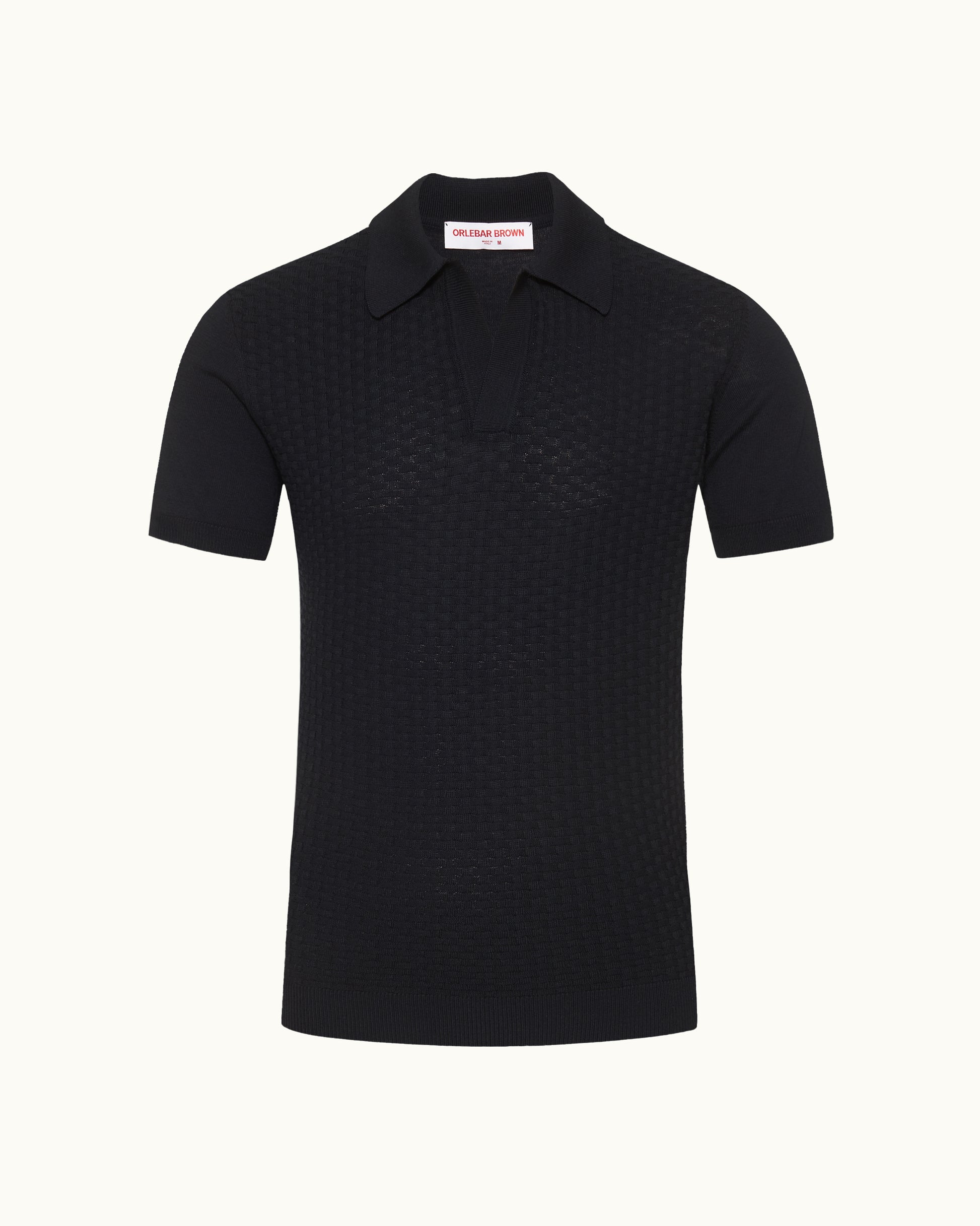 Black polo shirt on a white background