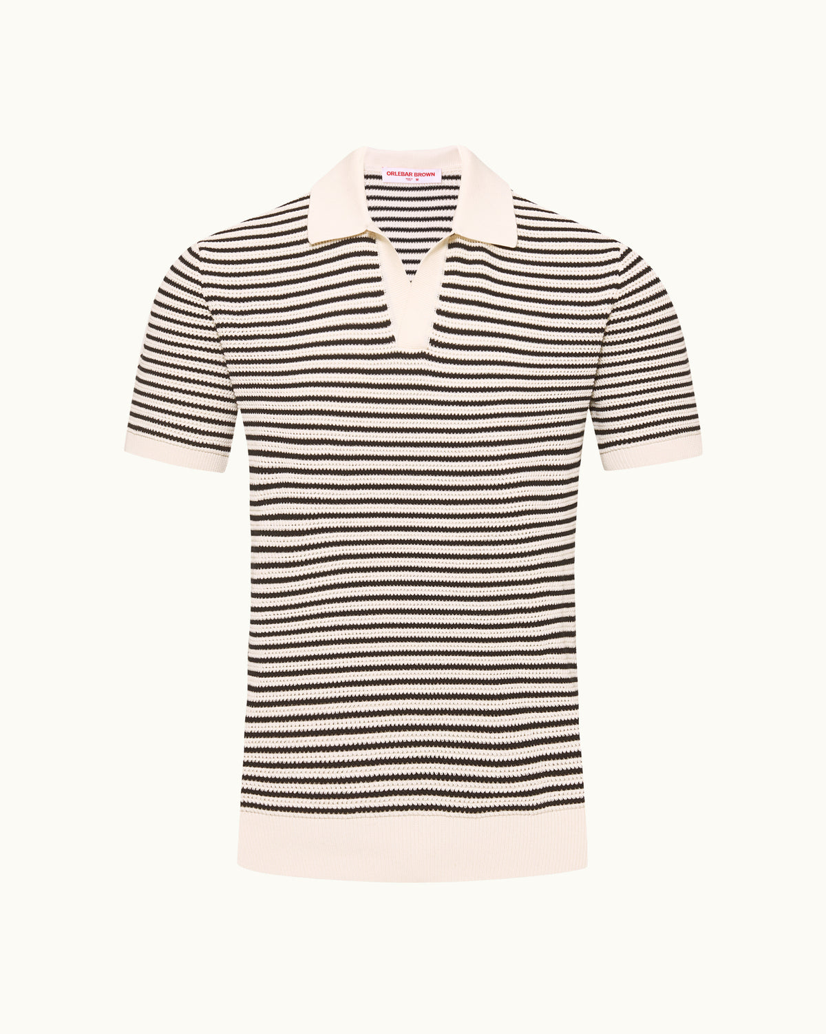 A short-sleeve knit polo shirt with horizontal black and cream stripes, featuring a solid cream collar, sleeve cuffs, and hem, displayed on a clean off-white background.