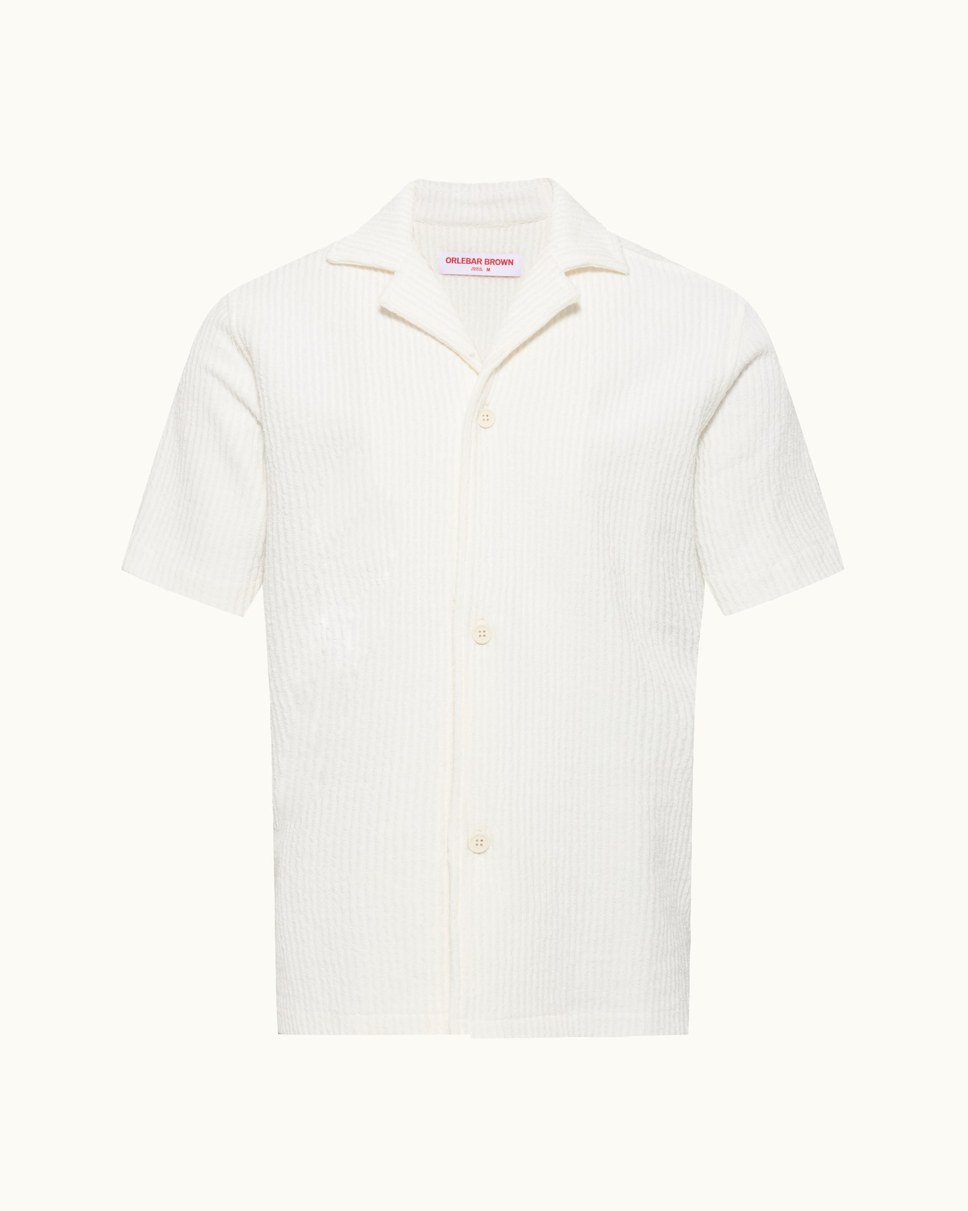 White short-sleeve shirt with collar on a white background