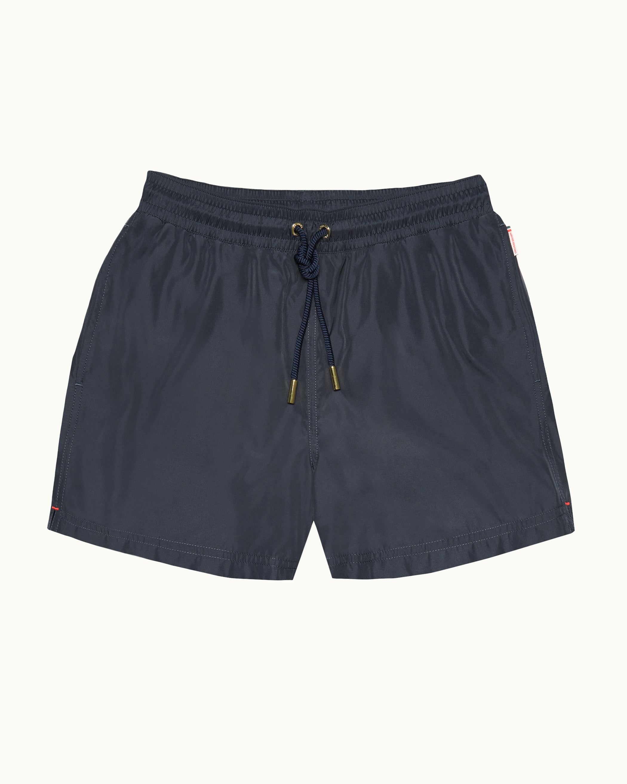 Navy blue shorts with drawstring on a white background