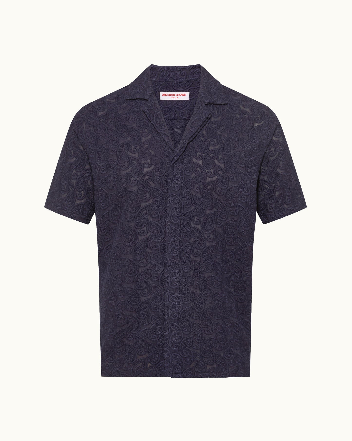 Navy embroidered shirt on a white background