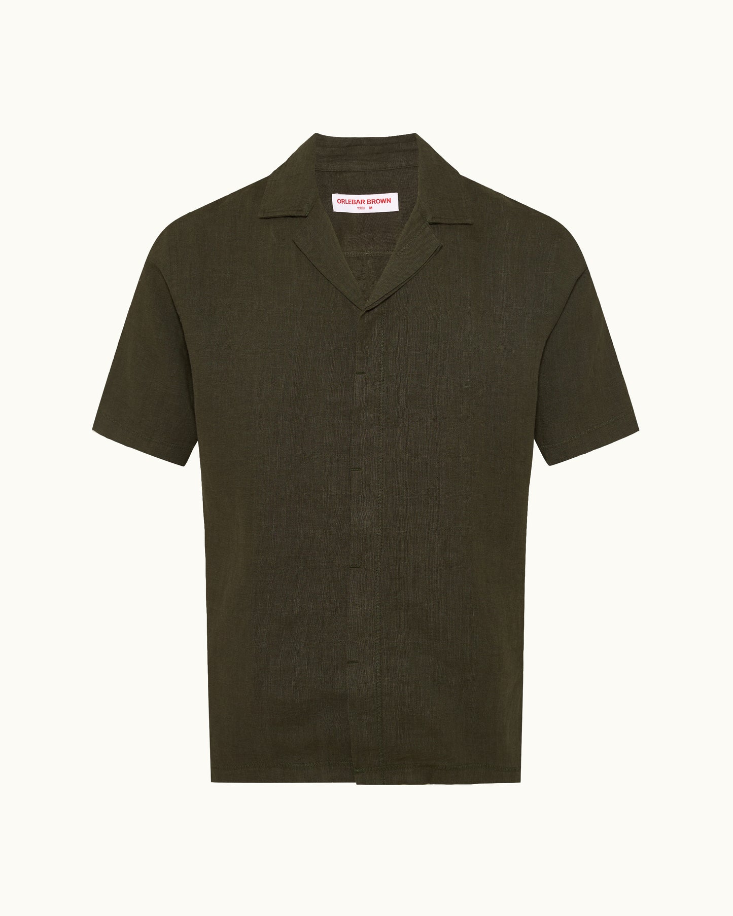 Green short-sleeve shirt on a white background