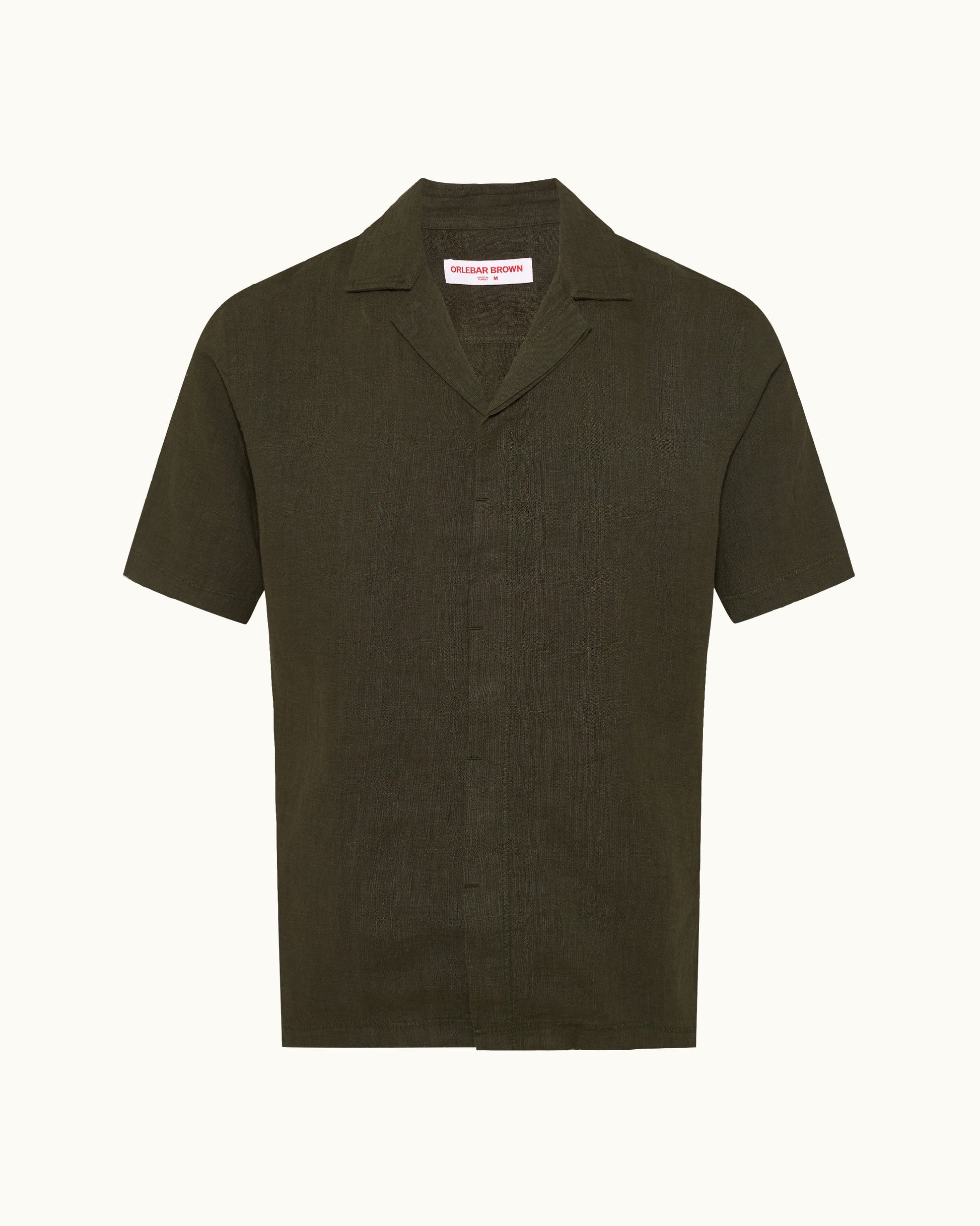 Green short-sleeve shirt on a white background