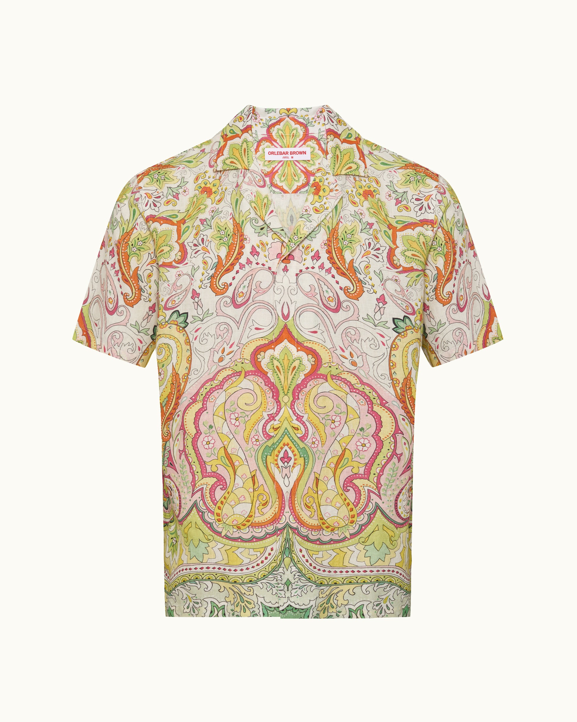 Colorful paisley patterned shirt on a white background