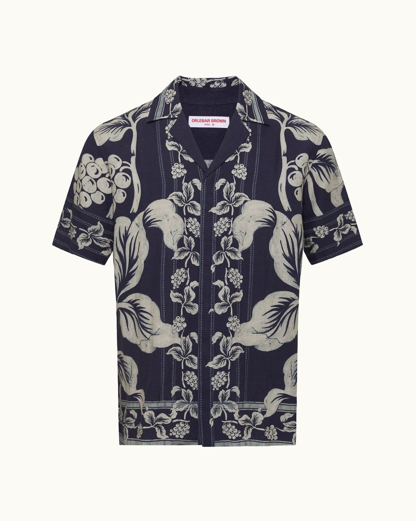 Navy blue shirt with white floral pattern on a white background