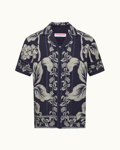 Navy blue shirt with white floral pattern on a white background