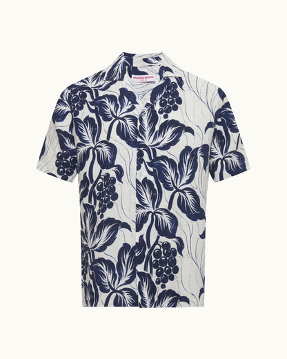 White shirt with navy blue floral pattern on a white background