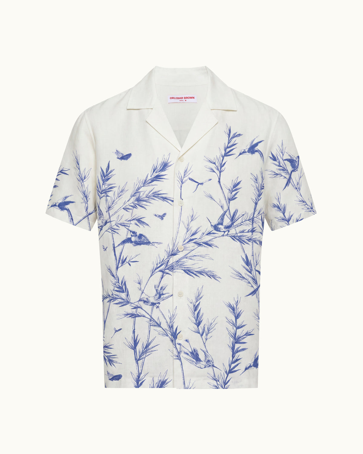 White shirt with blue floral pattern on a white background