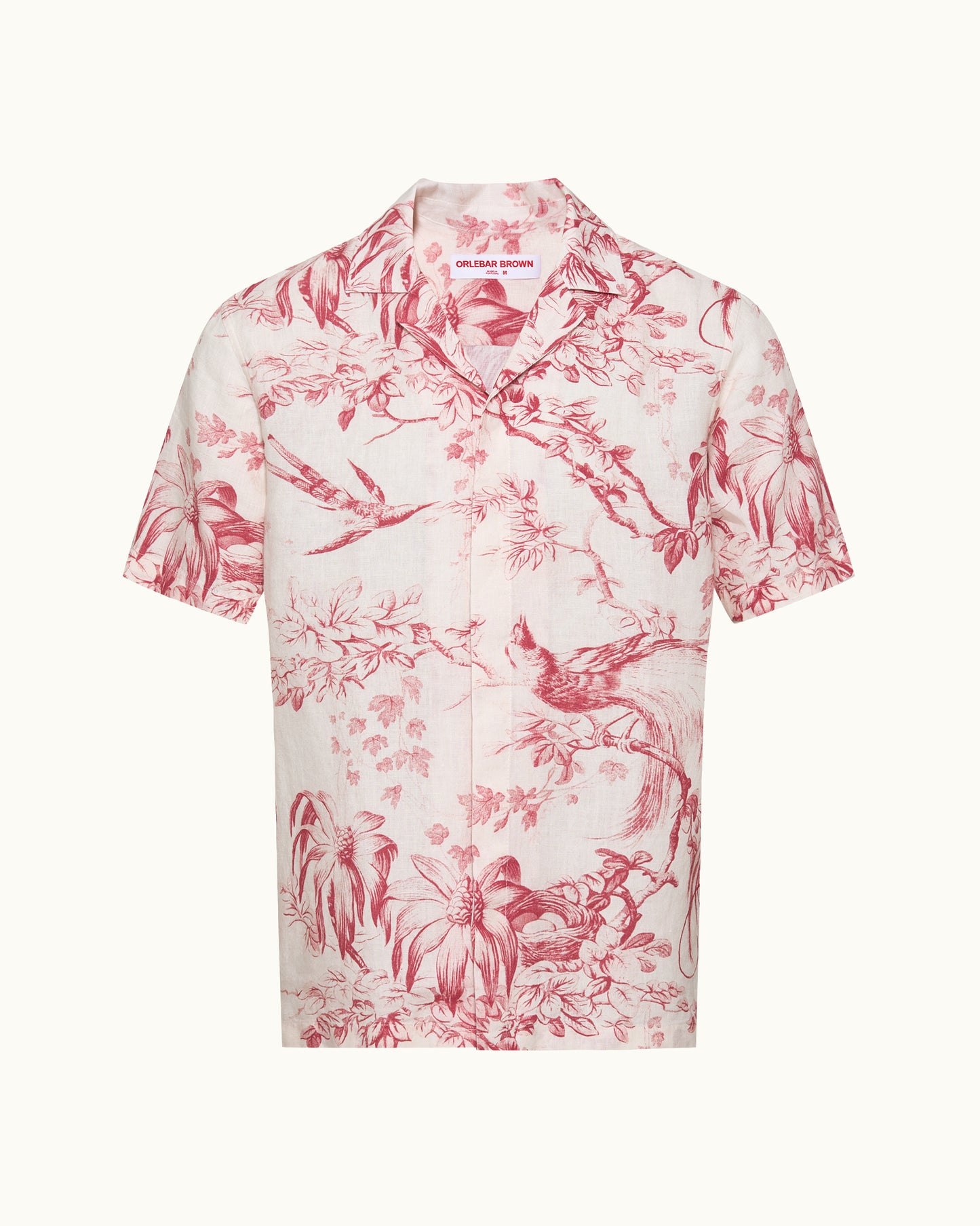 Pink floral patterned shirt on a white background