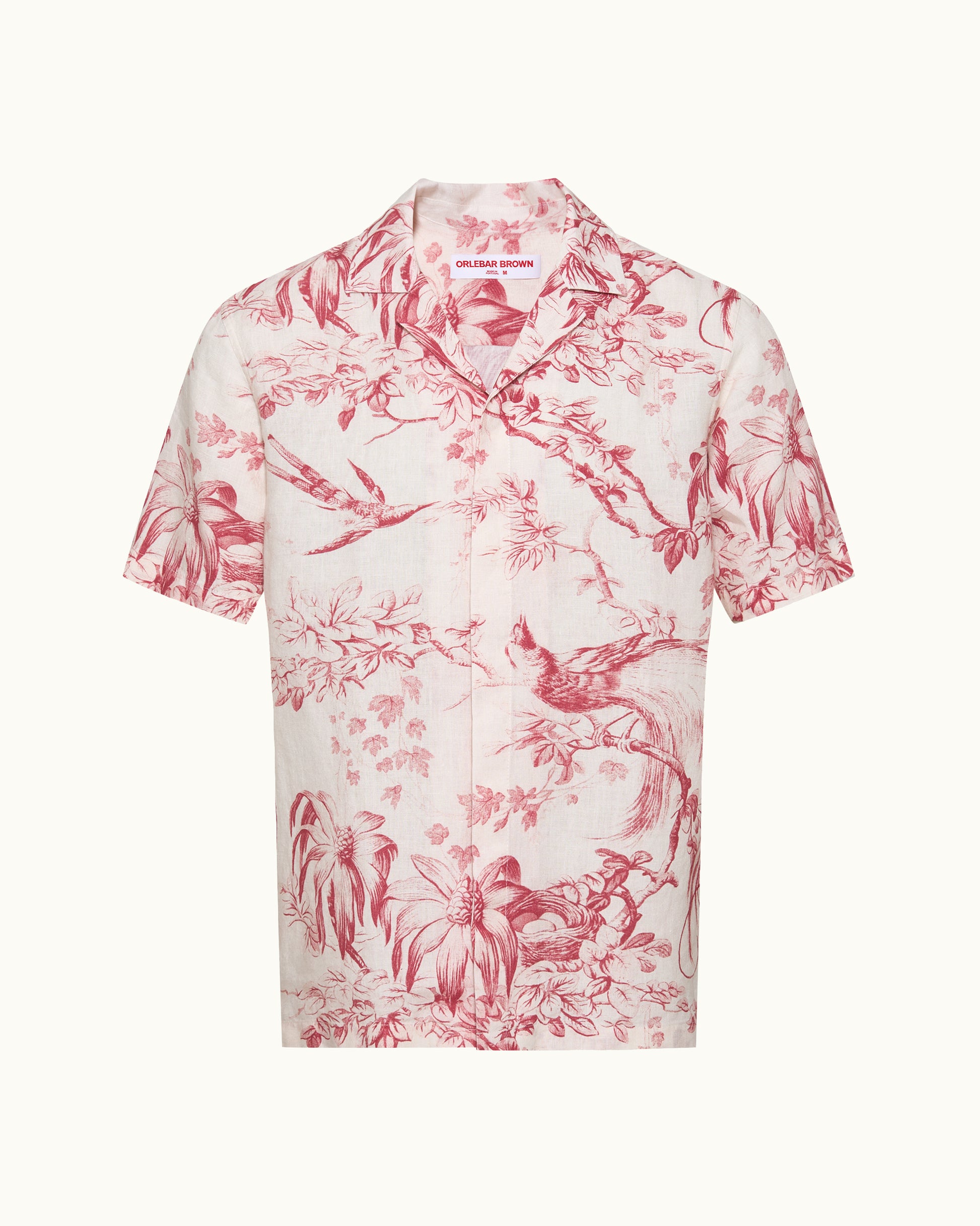 Pink floral patterned shirt on a white background