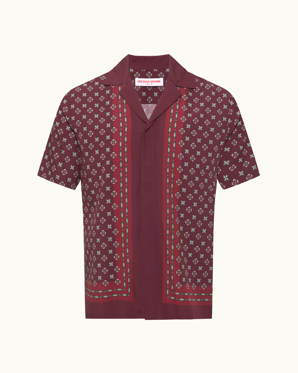 Maroon short-sleeve shirt with a pattern on a white background
