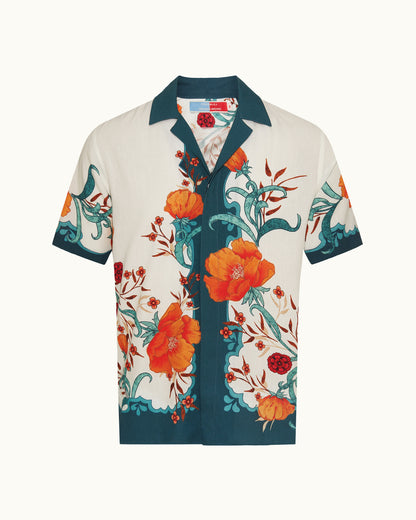 Colorful floral patterned shirt on a white background