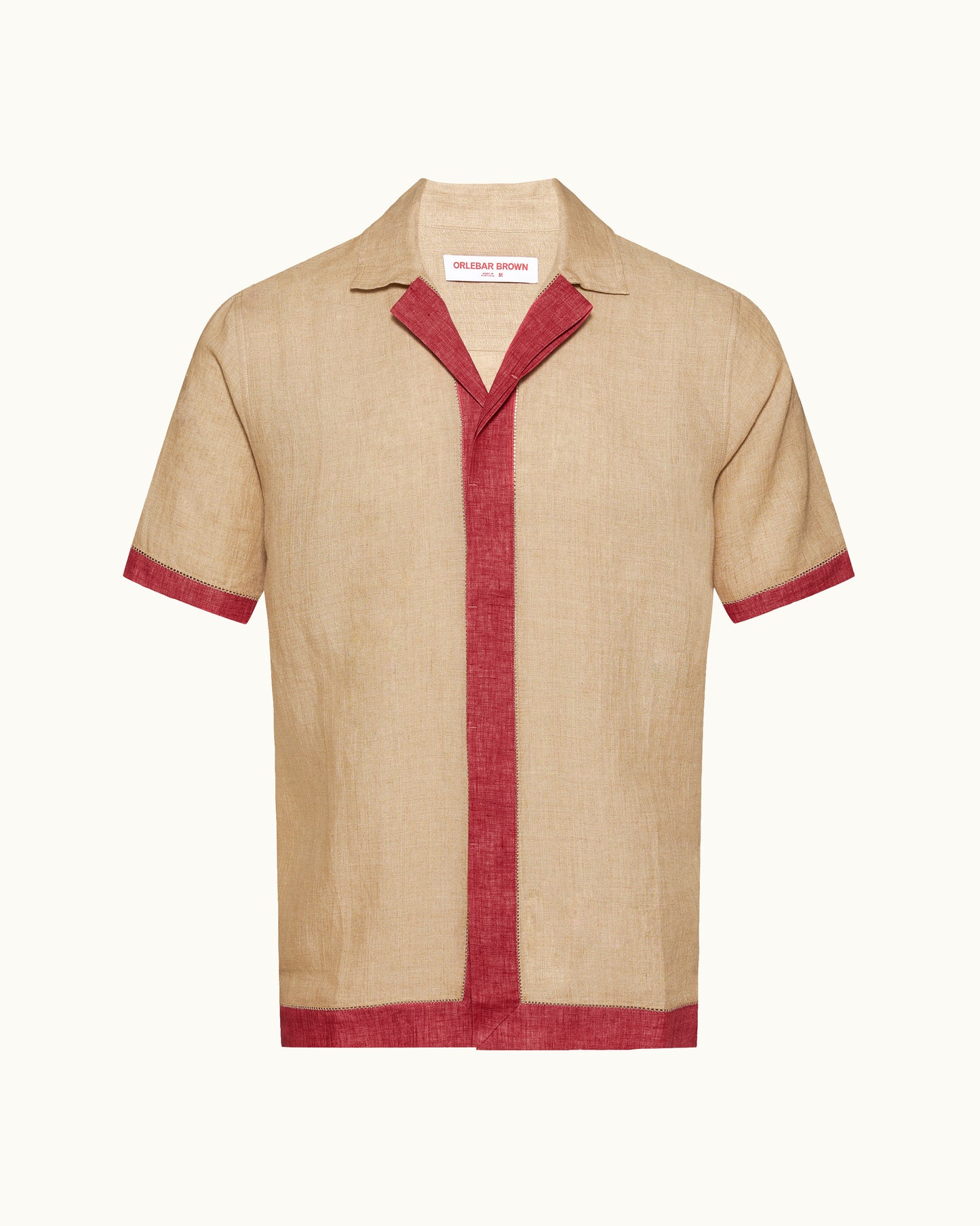 Beige shirt with red trim on a white background