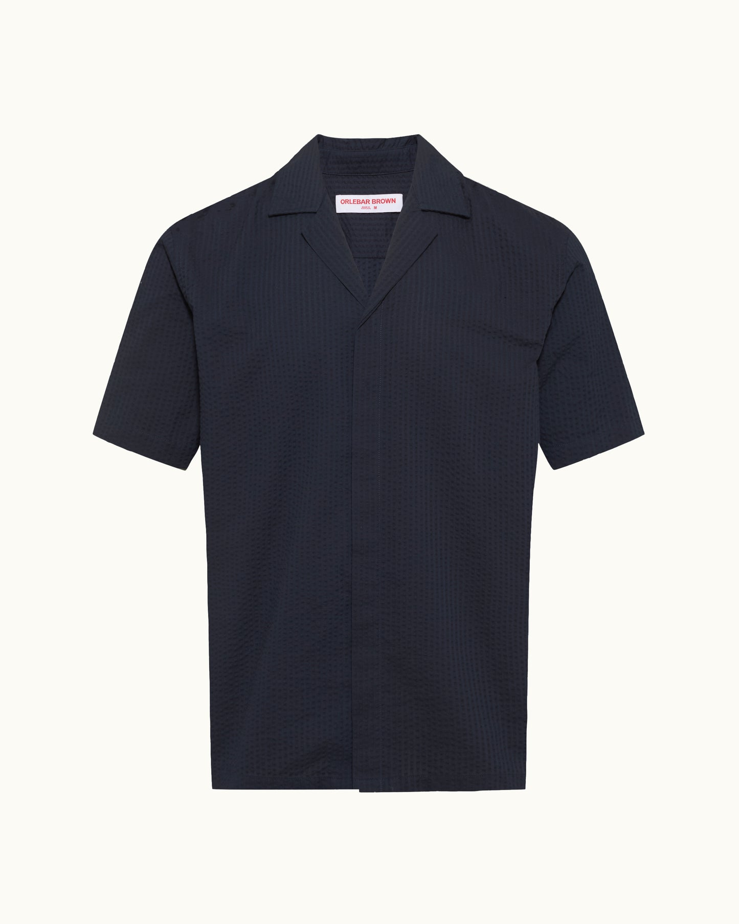 Navy blue short-sleeve shirt on a white background
