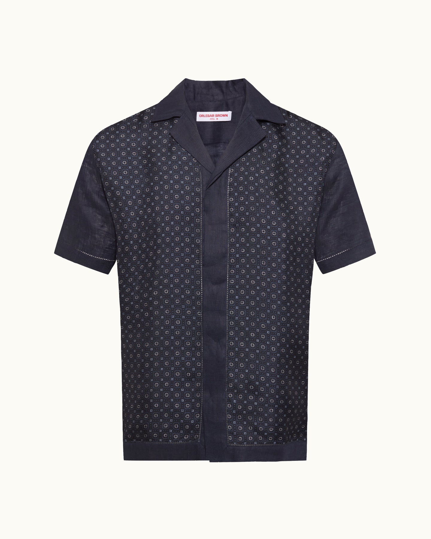 Navy patterned short-sleeve shirt on a white background
