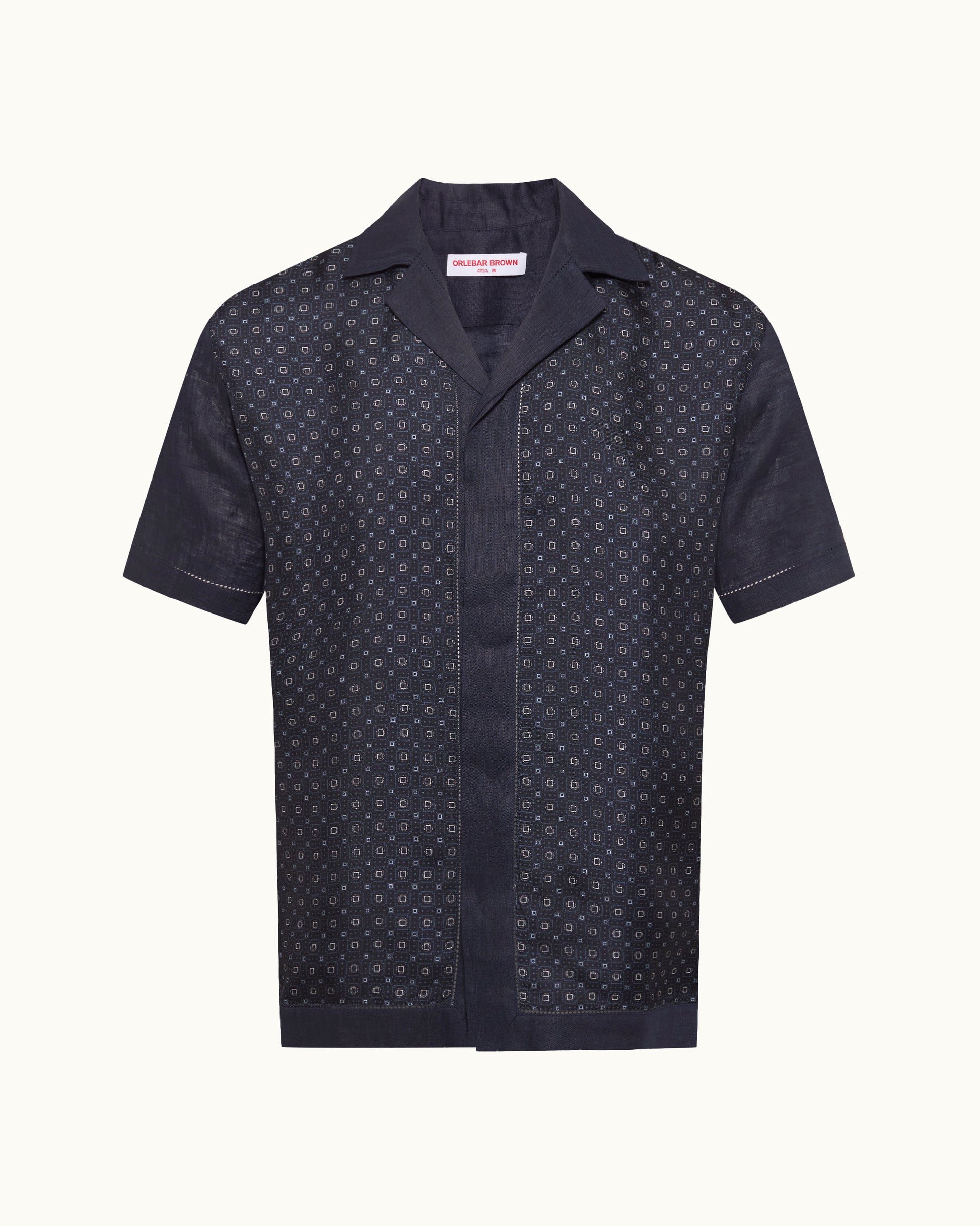 Navy patterned short-sleeve shirt on a white background