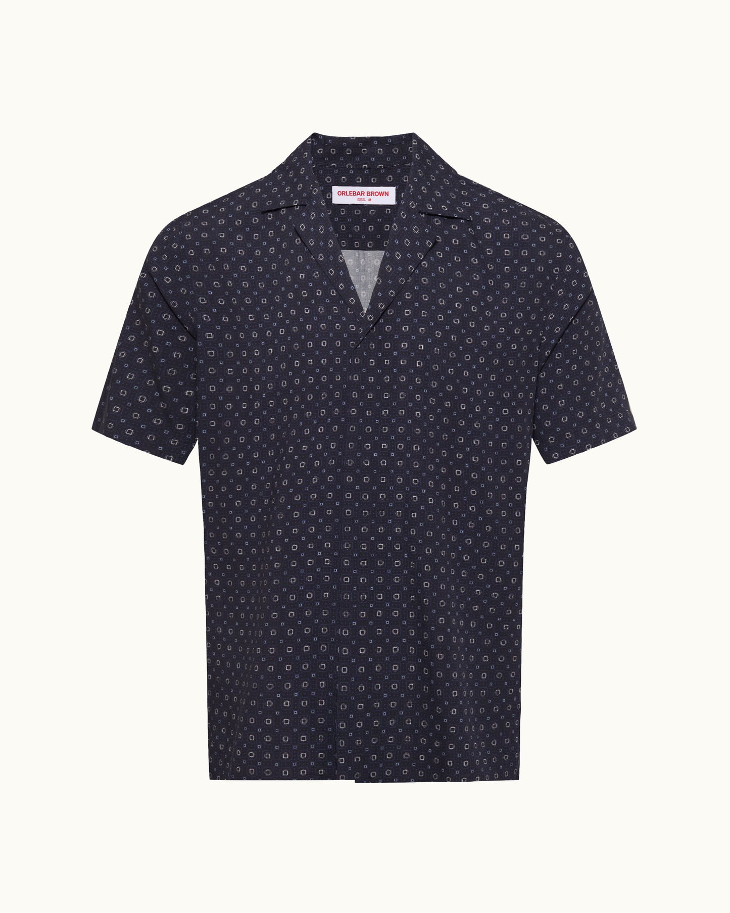 Navy blue polo shirt with white pattern on a white background