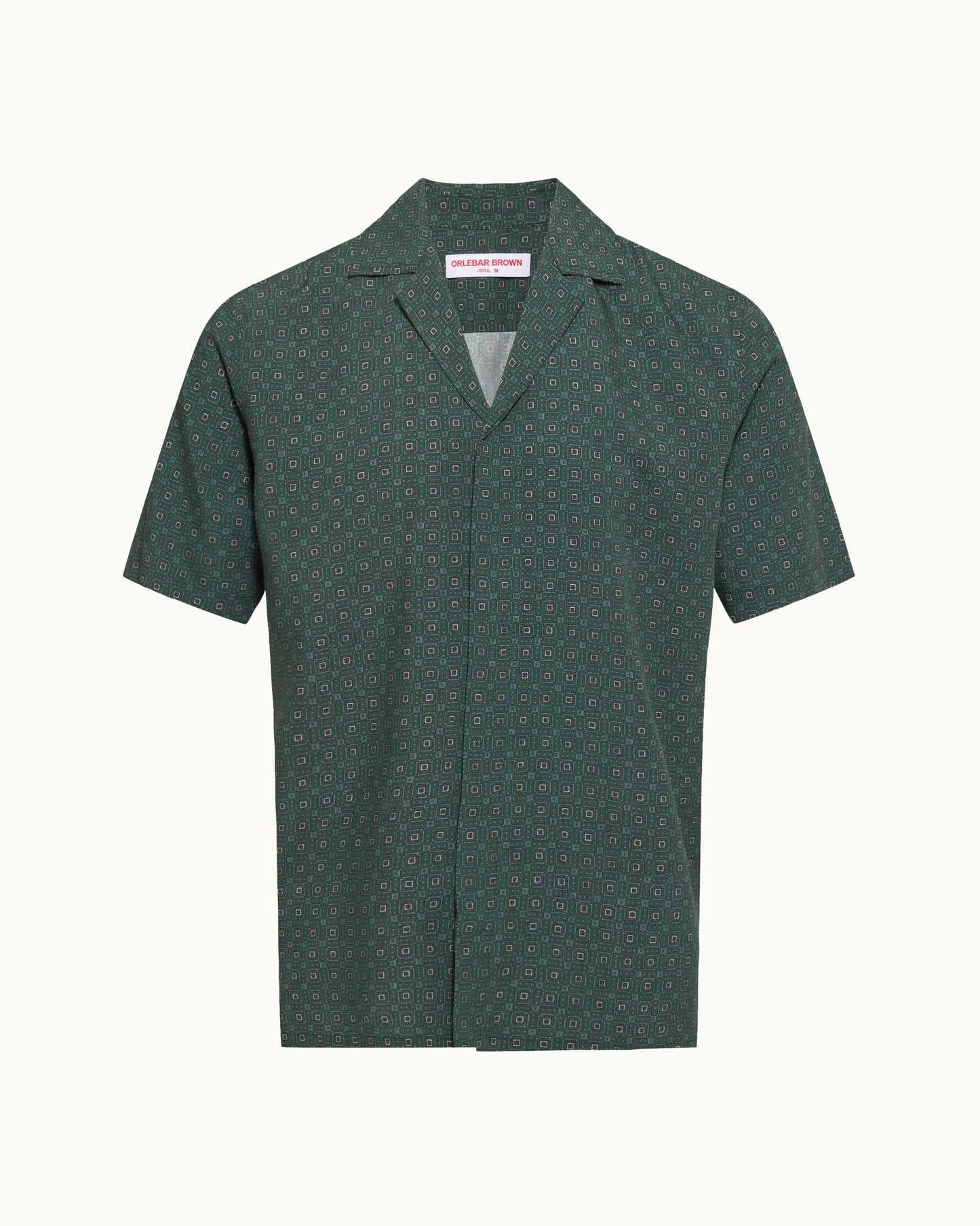 Green patterned shirt on a white background